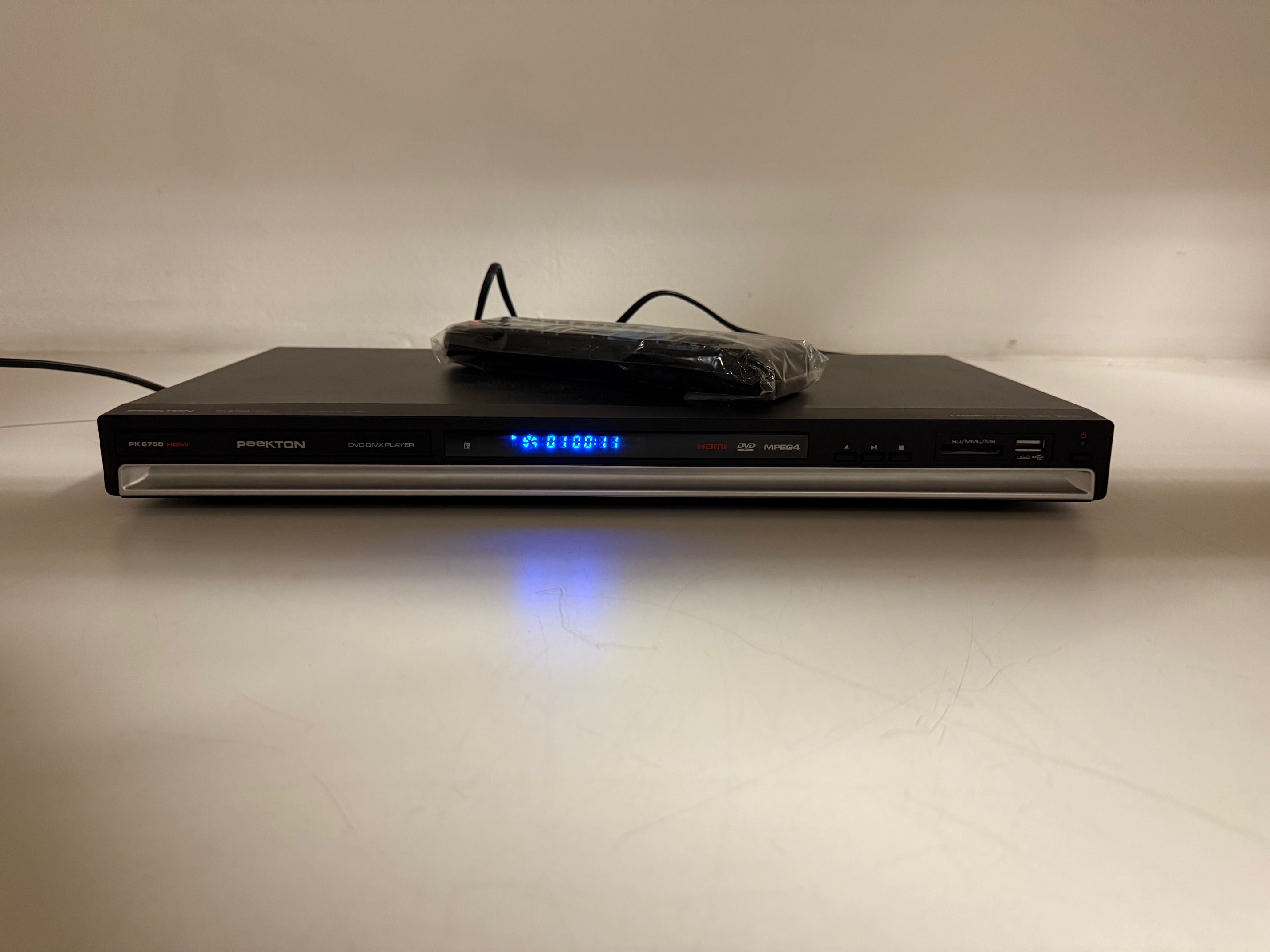 Onbekende PK 6750 HDMI DVD DIVX-speler met originele doos en afstandsbediening